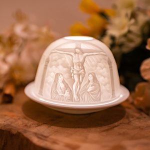 Iluminación Acogedora Portavelas de Porcelana Jesús en la Cruz
