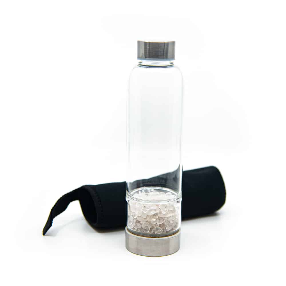 botella con gemas cristal de roca